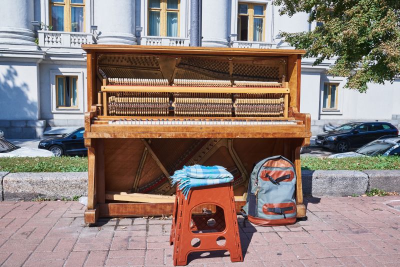 Piano being moved outdoors